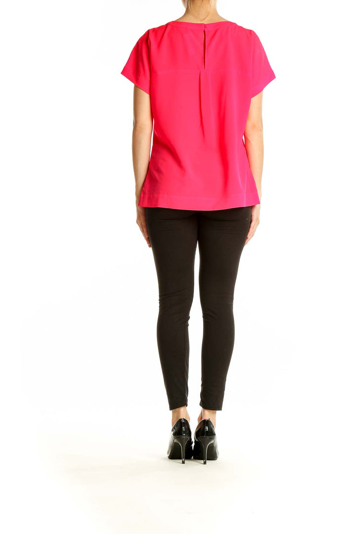 Back view of hot pink short-sleeve blouse from Banana Republic