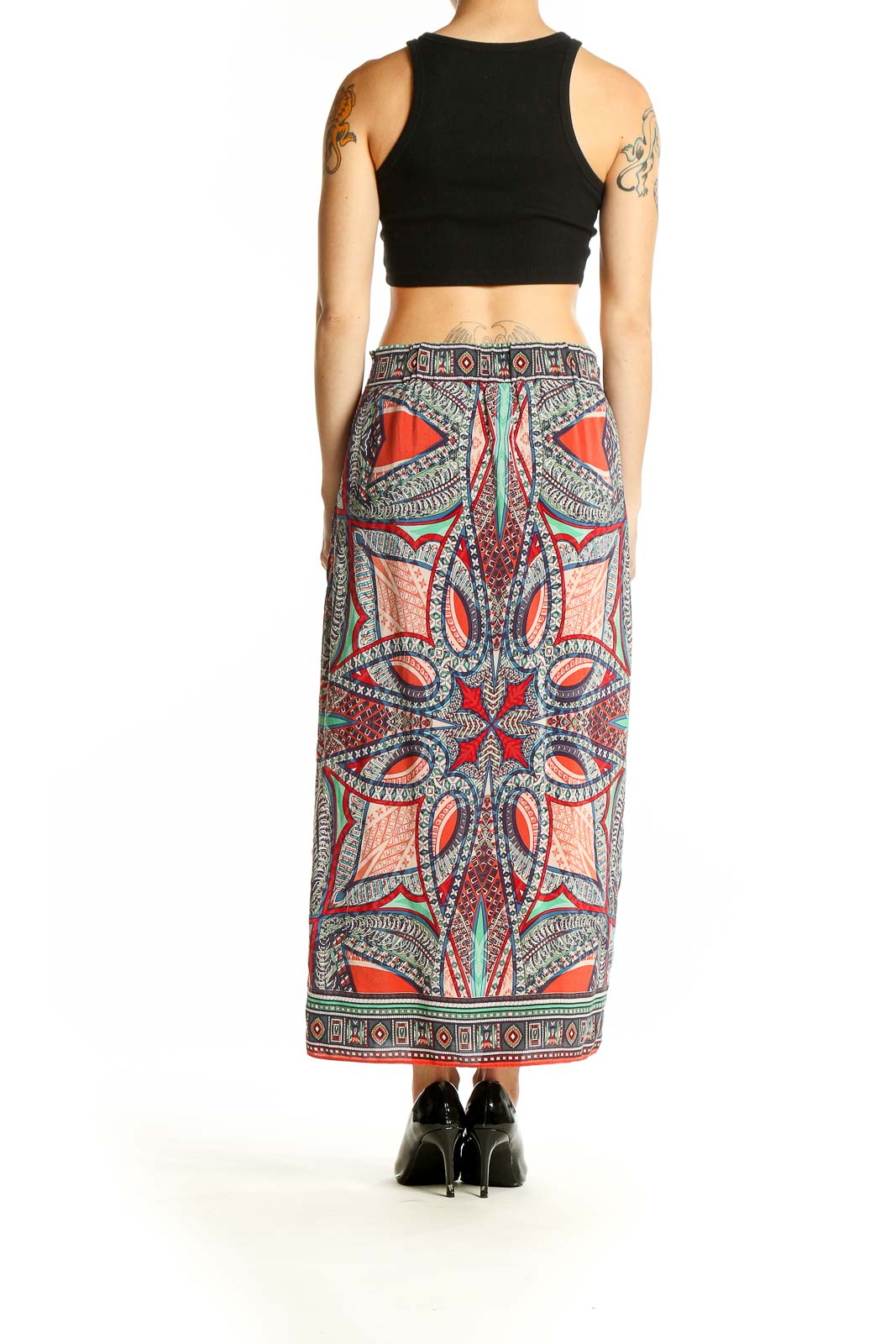 Side view of Maeve multicolor paisley print silk maxi skirt with black crop top