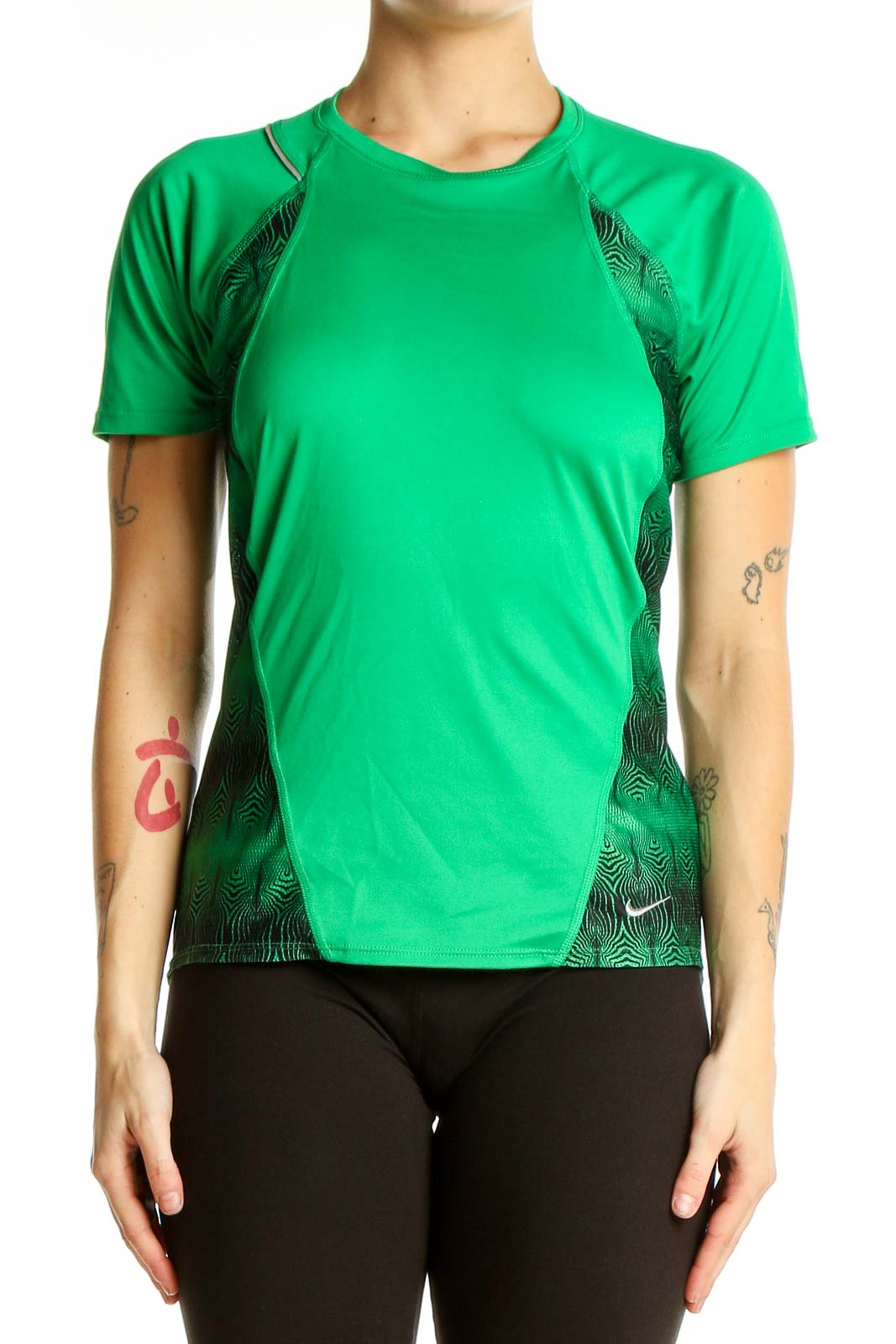 Front view of green Nike athletic t-shirt with black geometric side panels