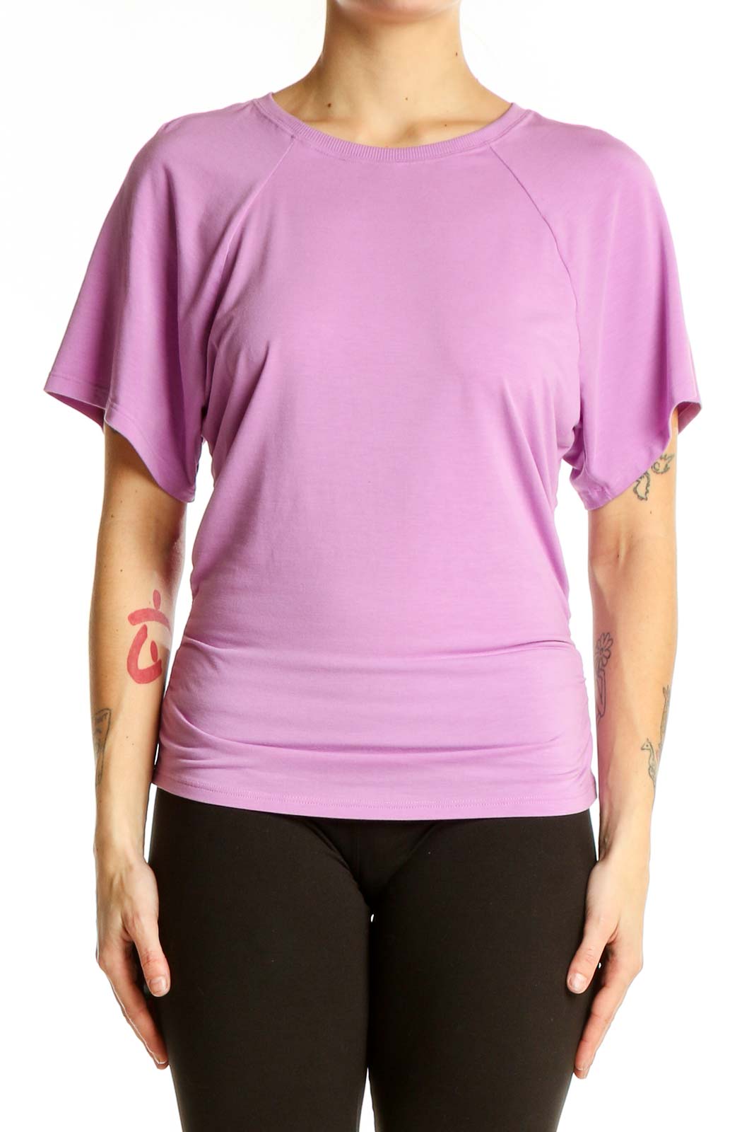 Front view of lavender Athleta activewear top with relaxed fit and short sleeves