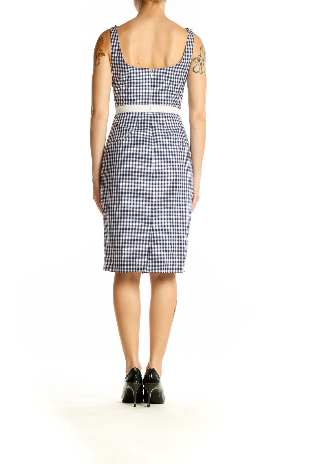 Side view of Altuzarra navy and white gingham sleeveless dress showing fitted silhouette