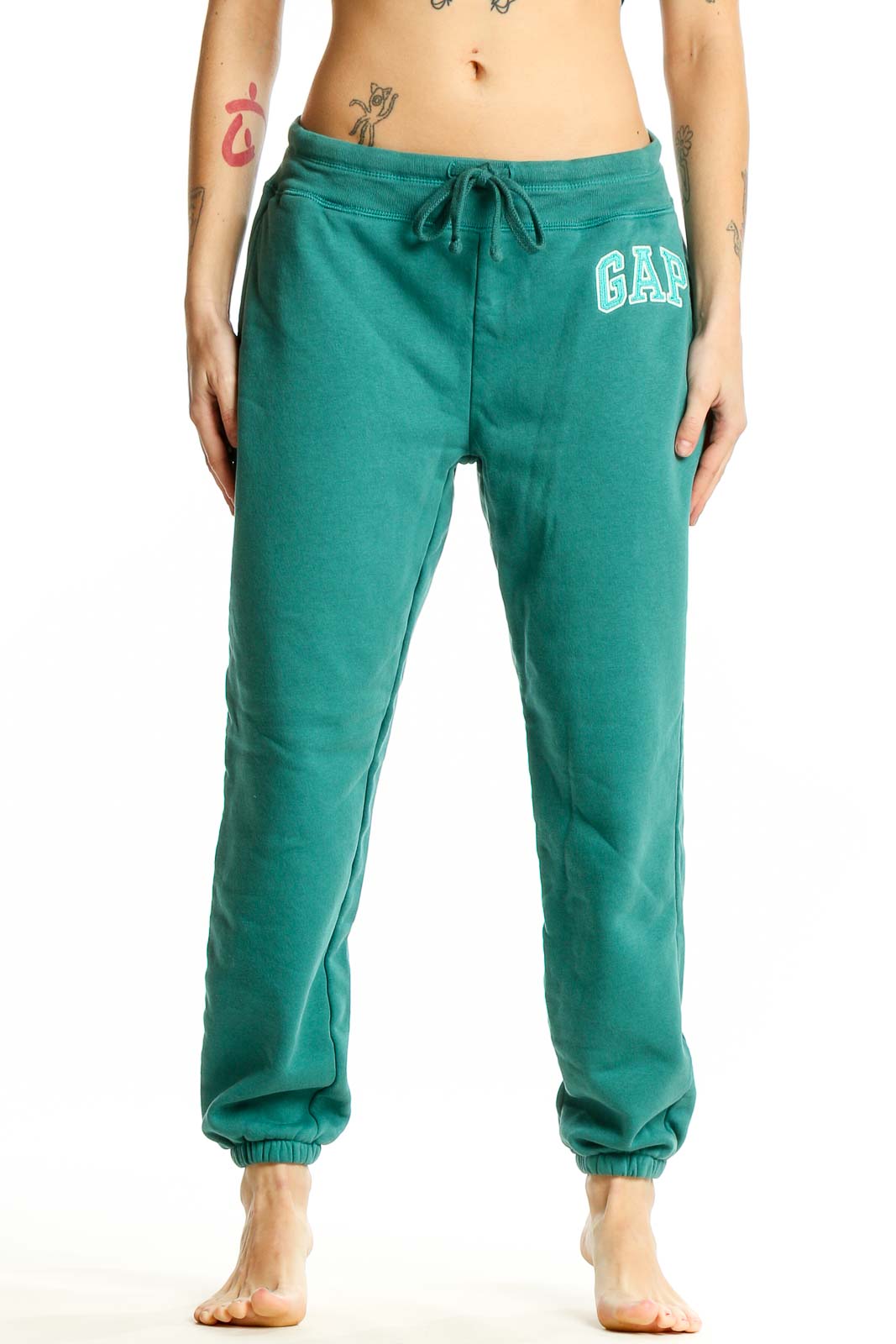 Front view of teal Gap sweatpants with drawstring waist