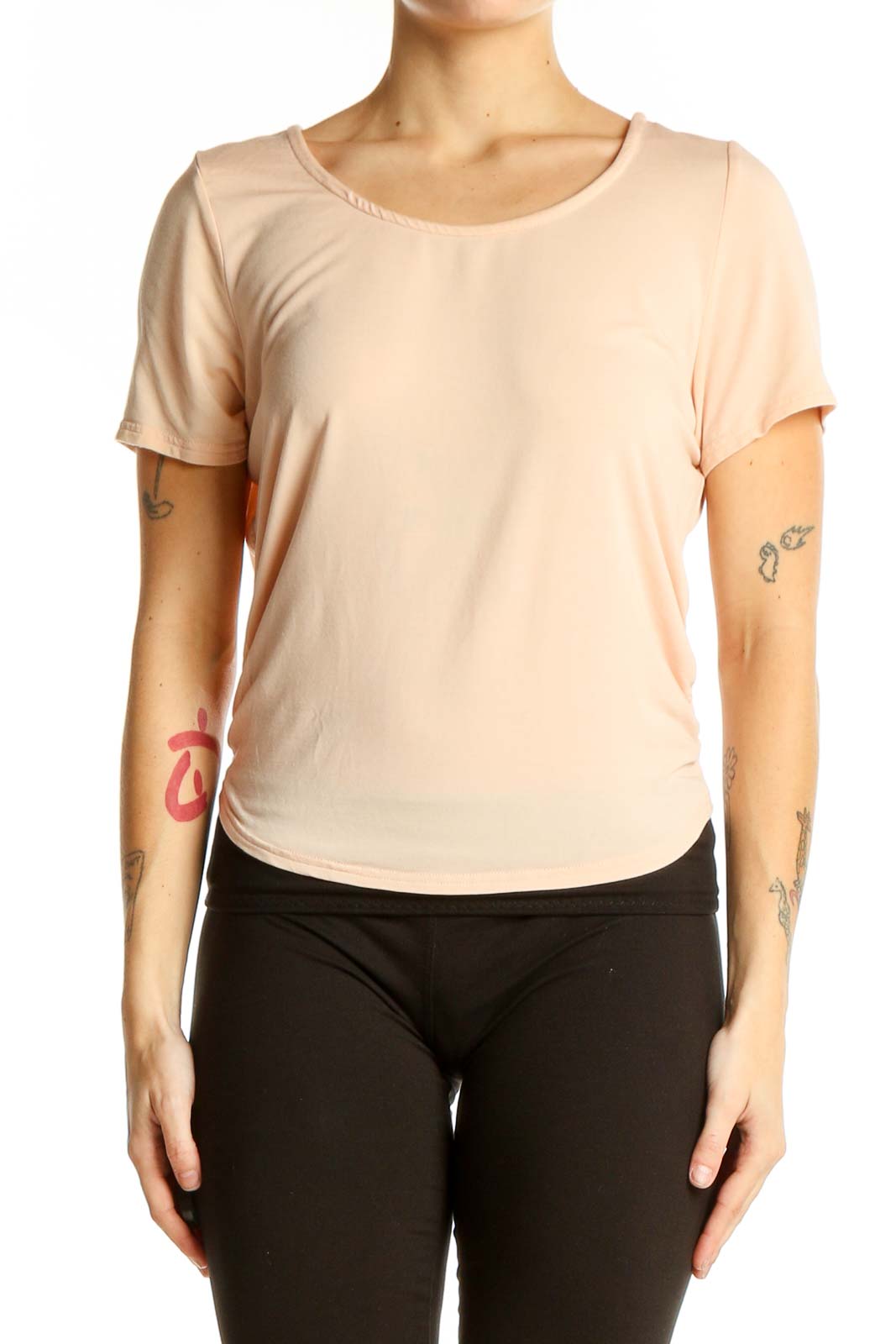 Front view of peach short-sleeve scoop neck top by Threads for Thought