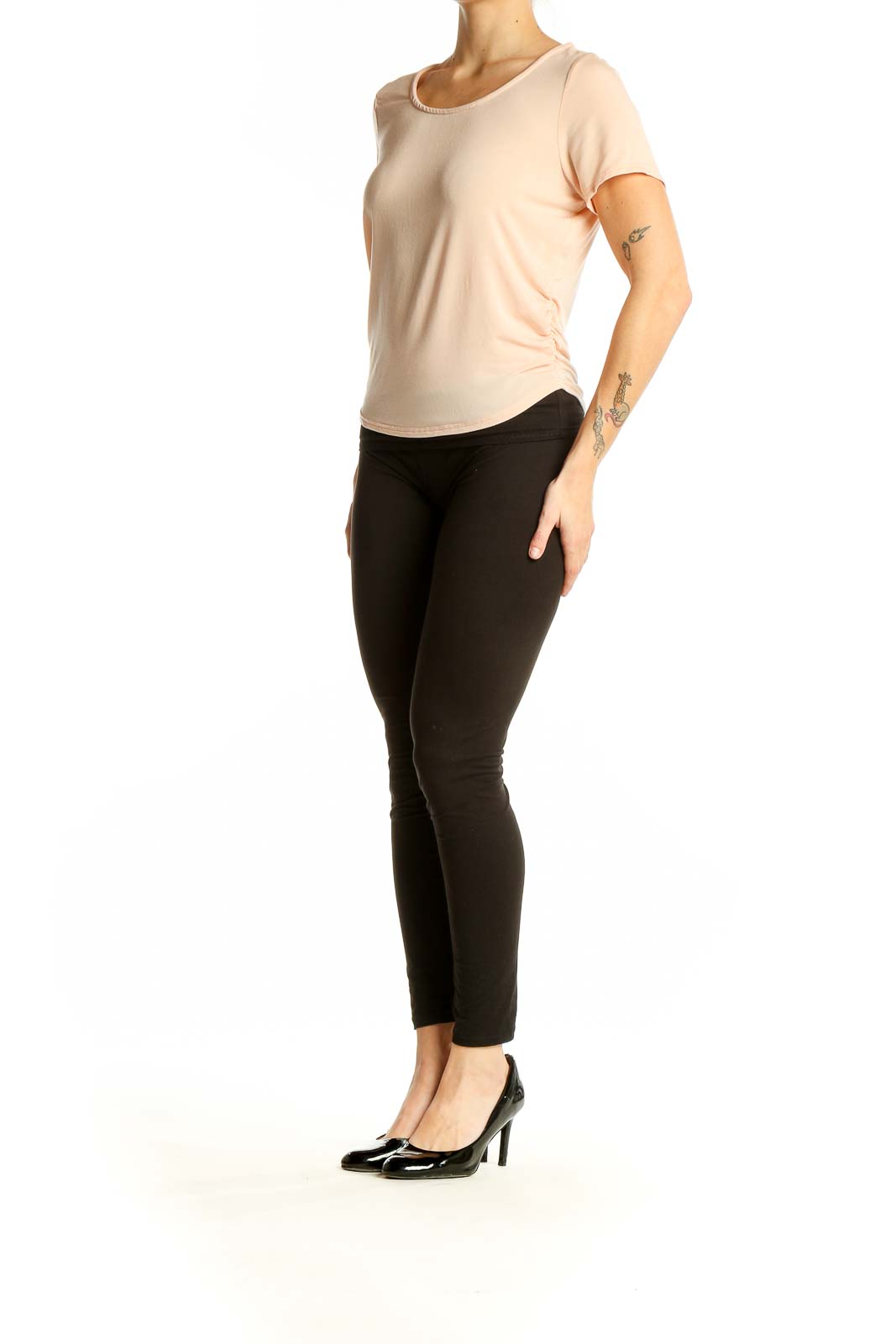 Front view of peach short-sleeve scoop neck top by Threads for Thought