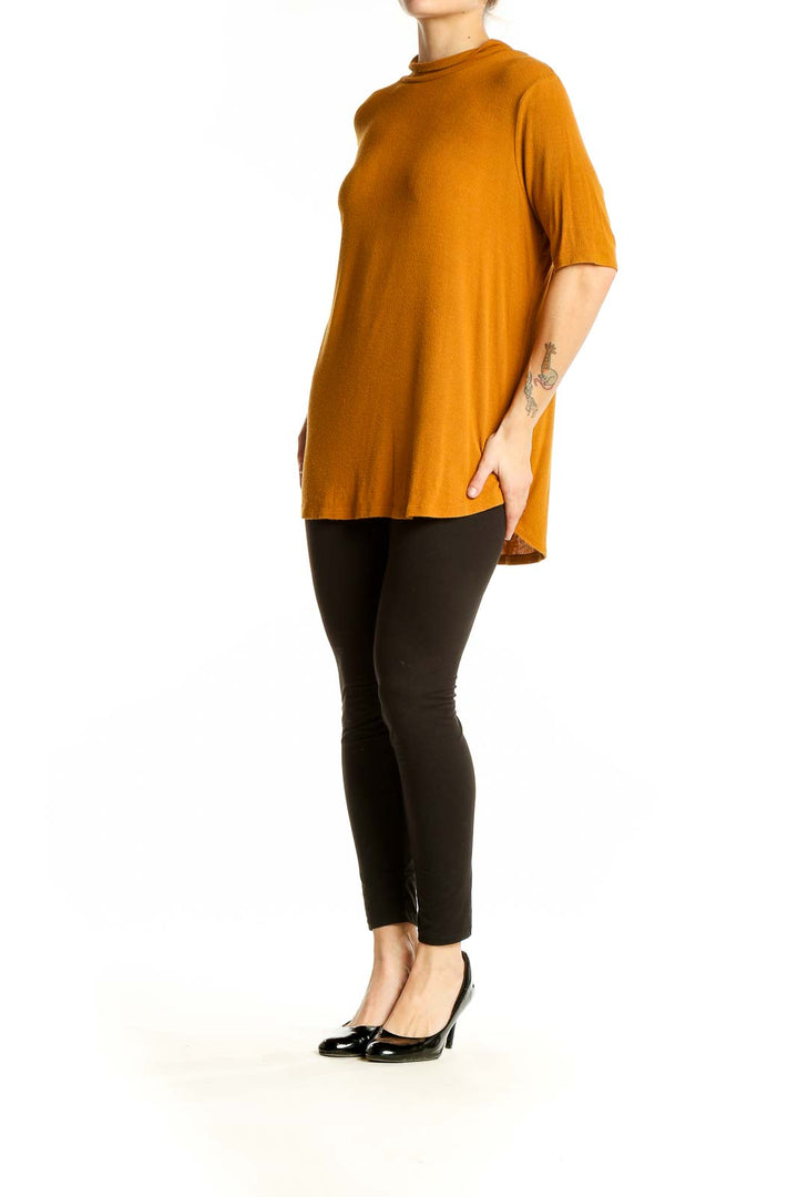 Front view of Simply Vera Vera Wang mustard mock neck elbow-sleeve top