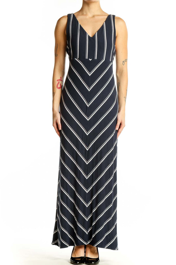 Front view of Athleta navy striped V-neck maxi dress with chevron pattern