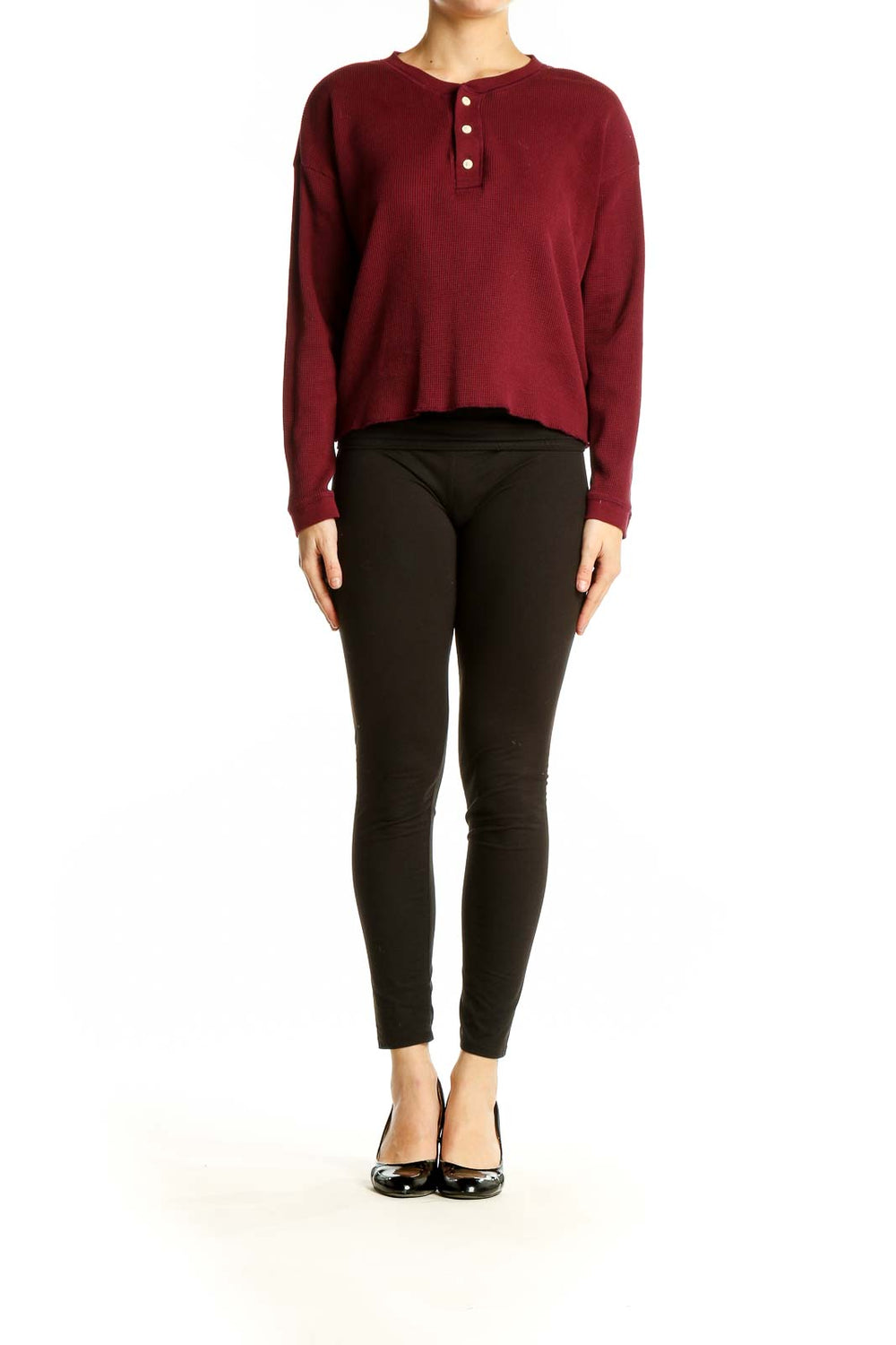 Front view of Everlane burgundy cotton henley knit top with button detail