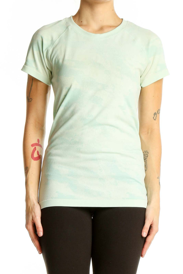 Front view of mint green Athleta performance t-shirt