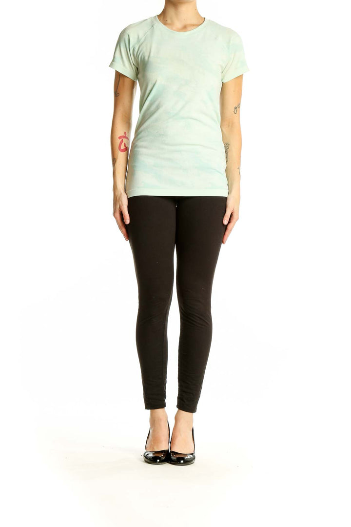 Front view of mint green Athleta performance t-shirt