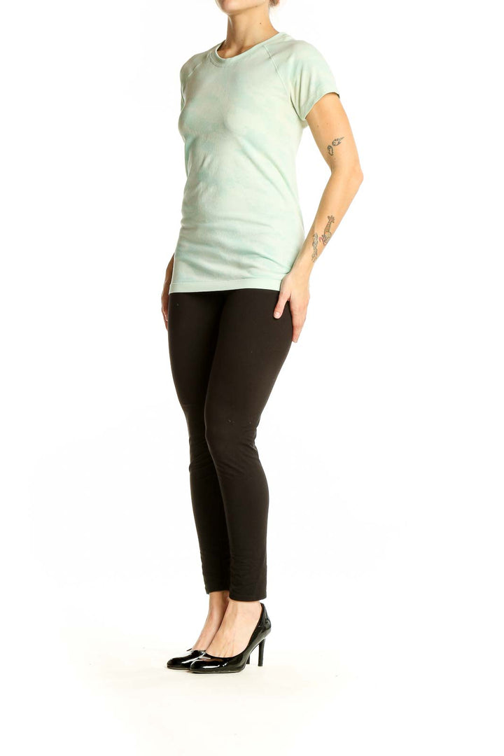 Front view of mint green Athleta performance t-shirt