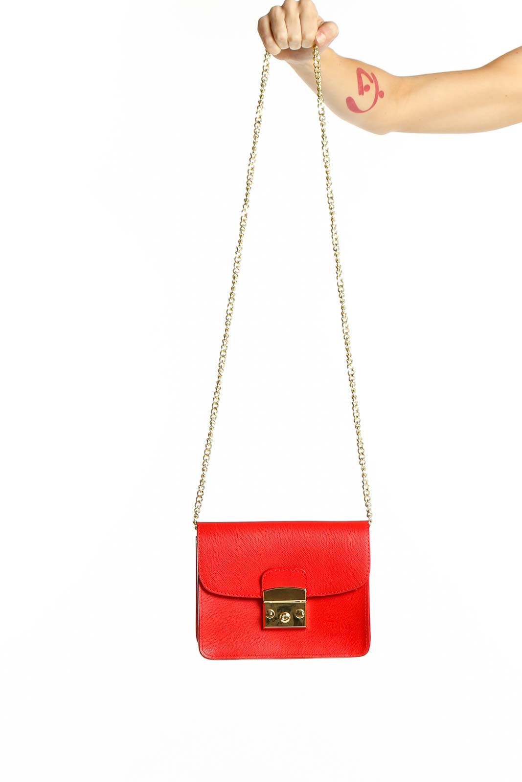 Front view of Toro Firenze red leather crossbody bag with gold chain