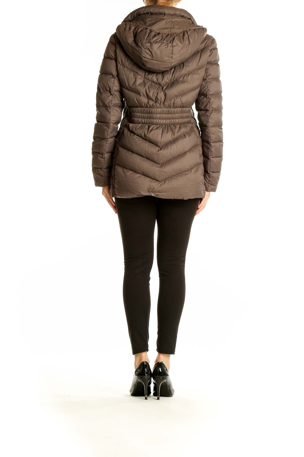 Side view of Michael Kors brown quilted nylon puffer jacket showing chevron pattern