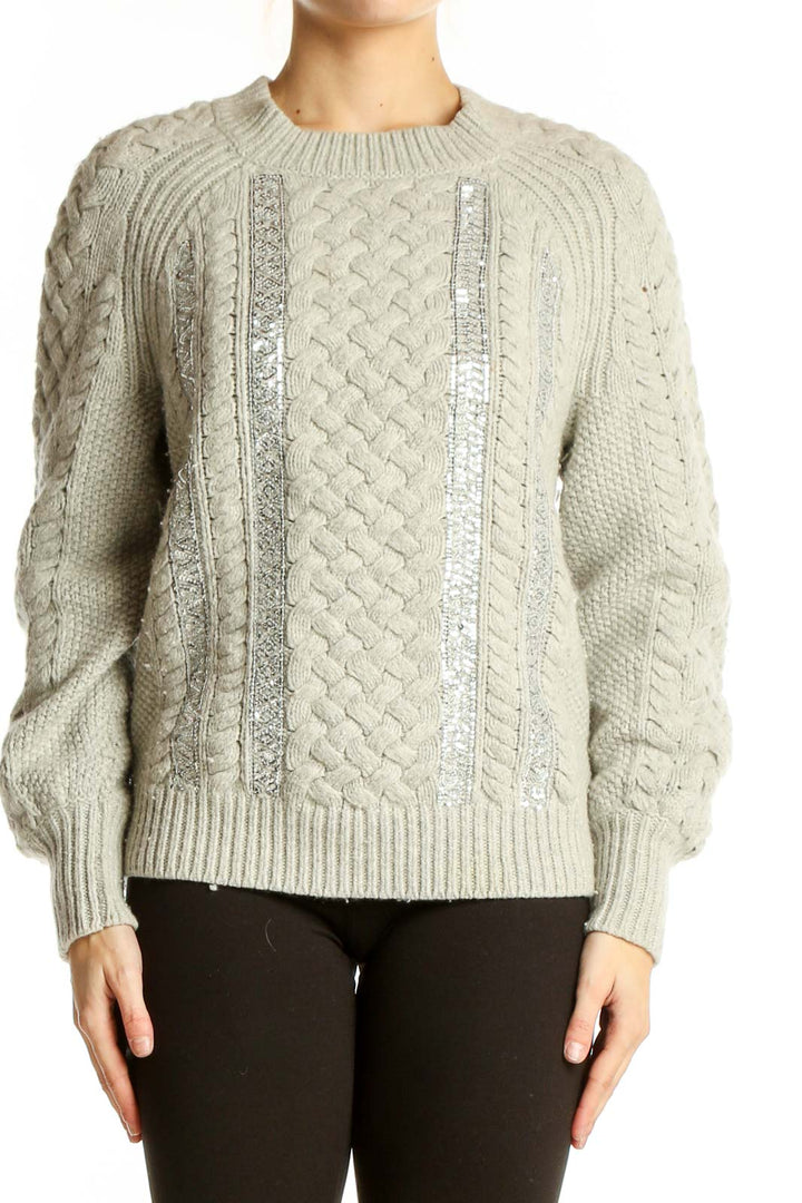 Front view of J.Crew beige cable knit sweater with sequin embellishments