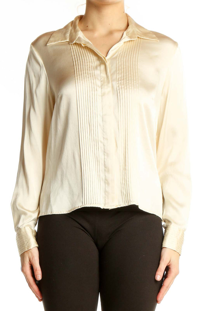 Front view of Alfani cream silk blouse with pleated detail