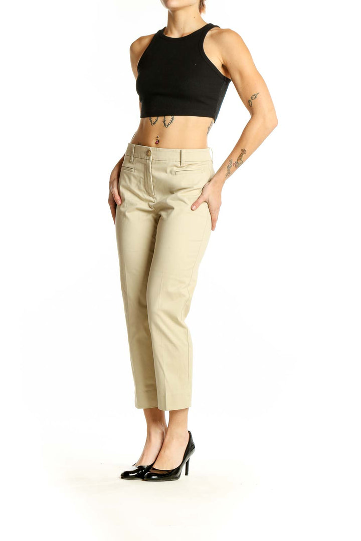 Front view of Ann Taylor beige cropped trousers on model