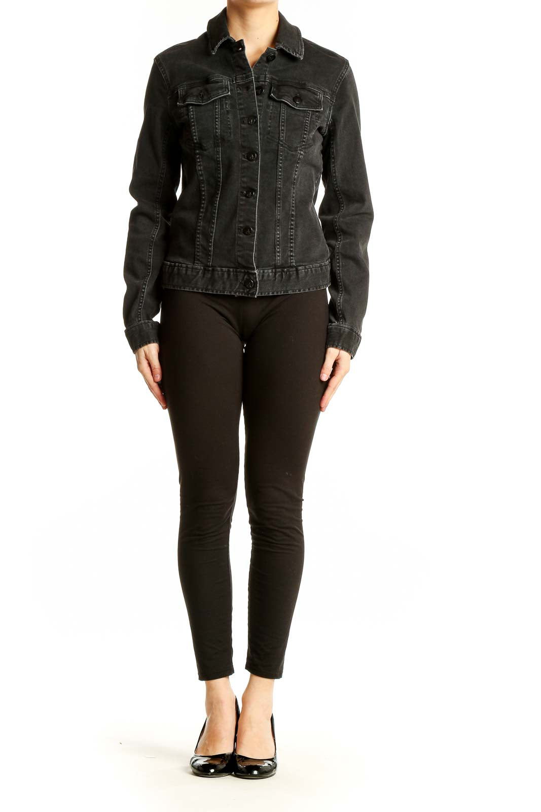 Front view of Calvin Klein black denim jacket on model