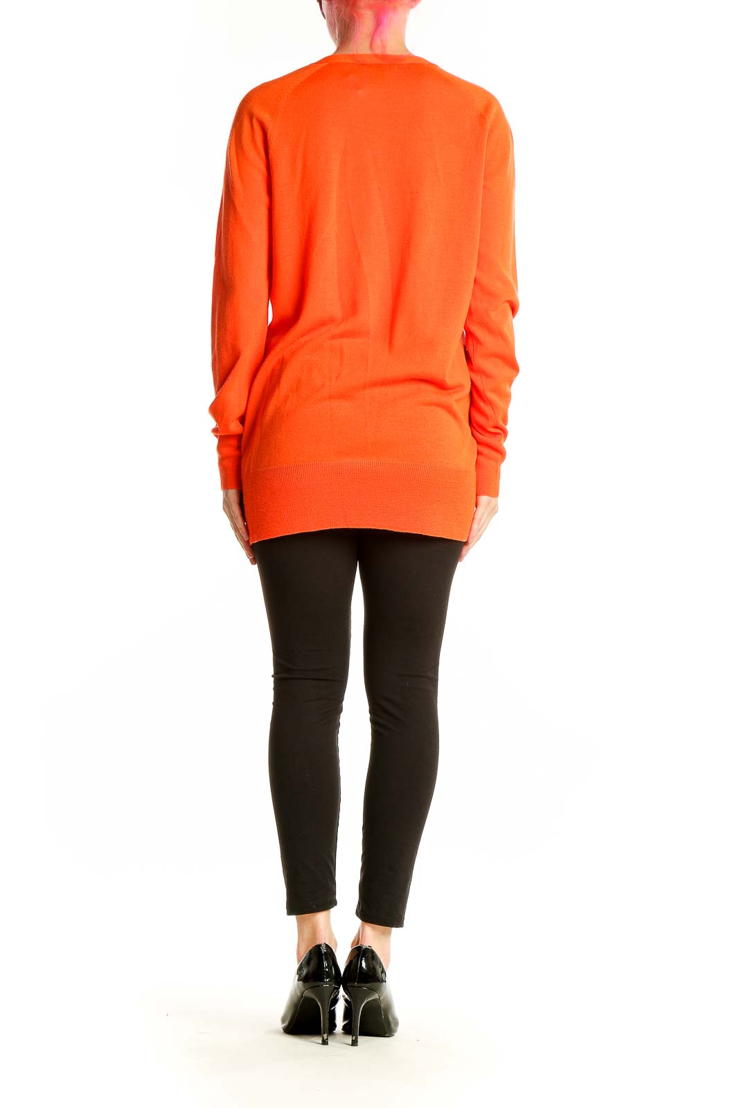 Side view of orange J.Crew Merino wool cardigan showing relaxed fit and length