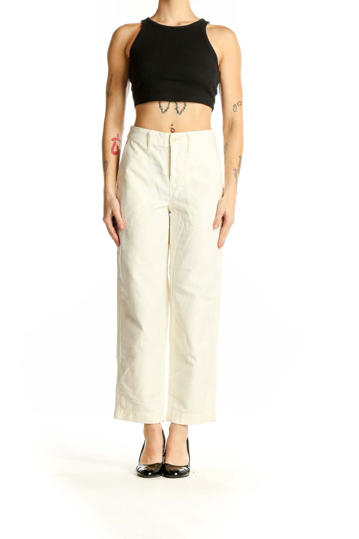 Front view of J.Crew cream cotton wide-leg trousers on model