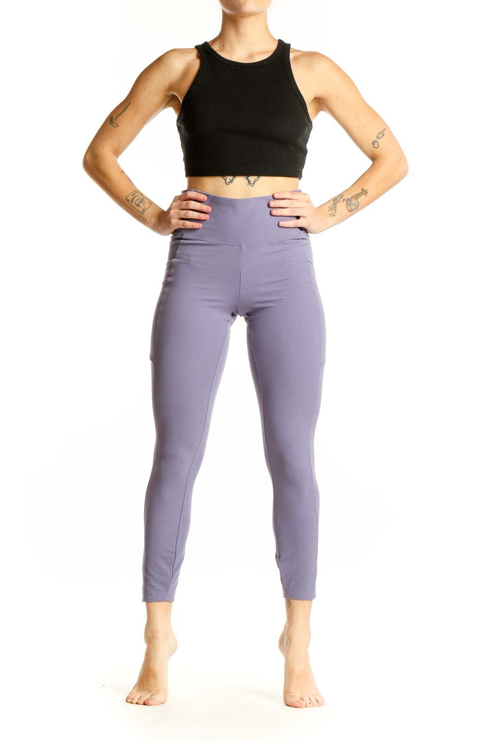 Front view of lavender high-waisted performance leggings by REI COOP