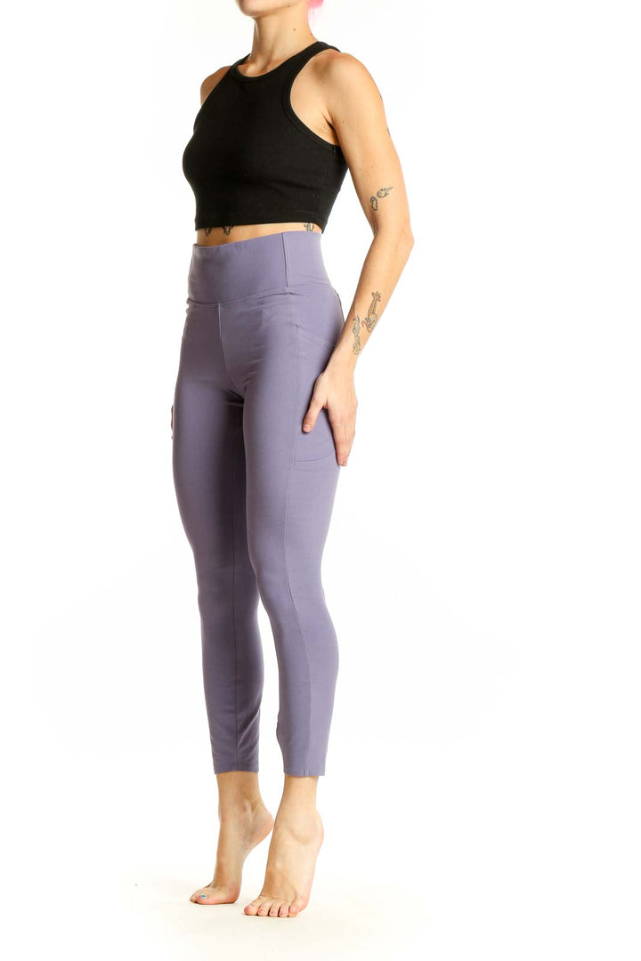 Front view of lavender high-waisted performance leggings by REI COOP