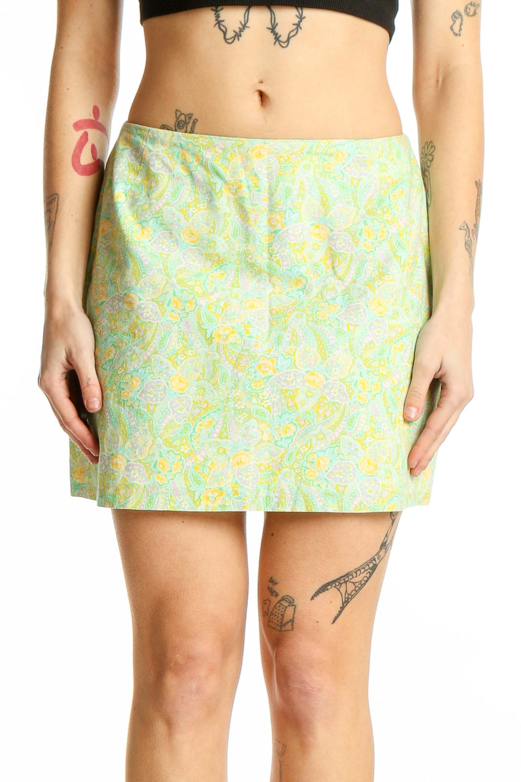 Front view of Thoshanna pastel green floral mini skirt