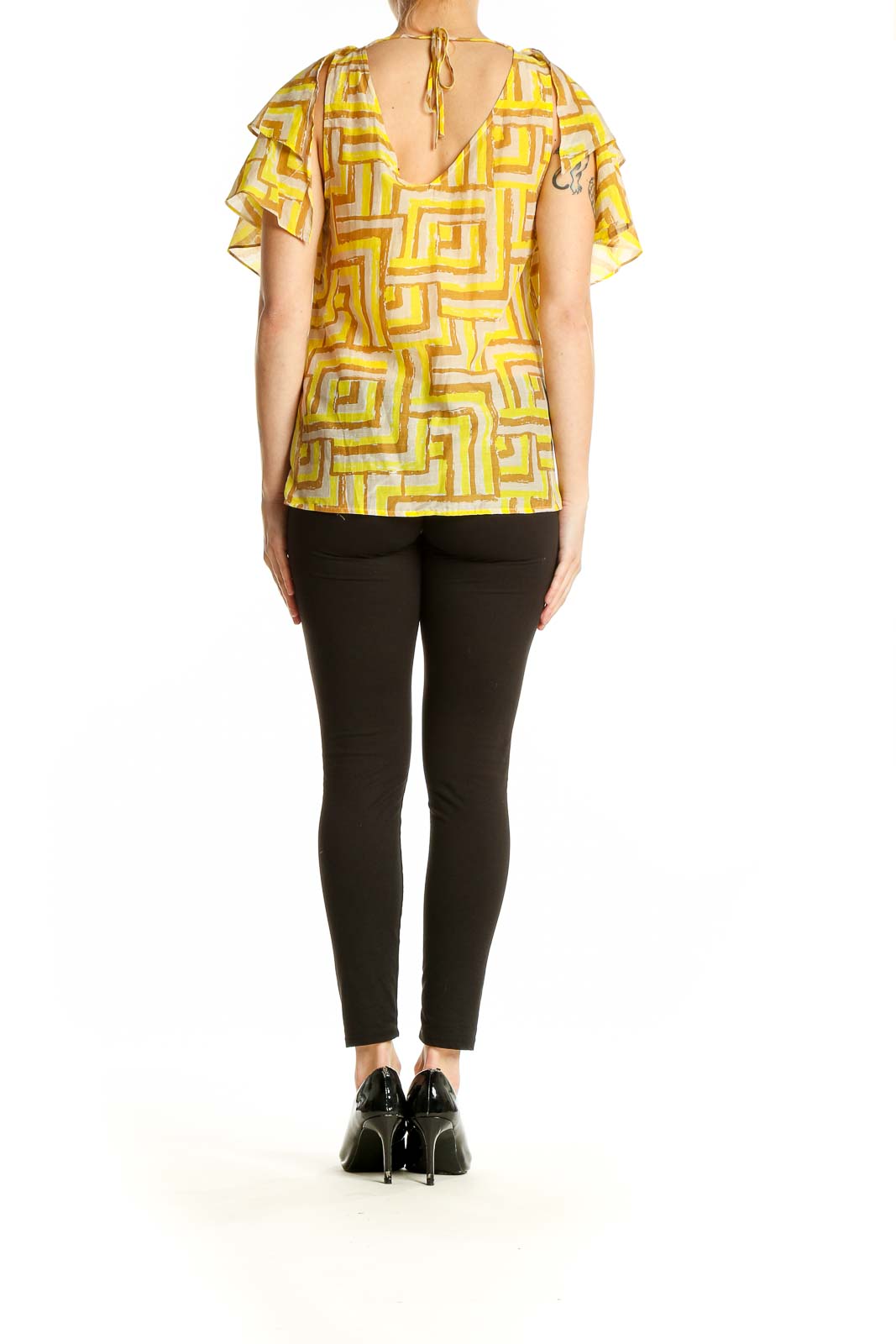 Side view of Sugarlips Yellow Geometric Print Ruffled Blouse showing fluttery sleeves