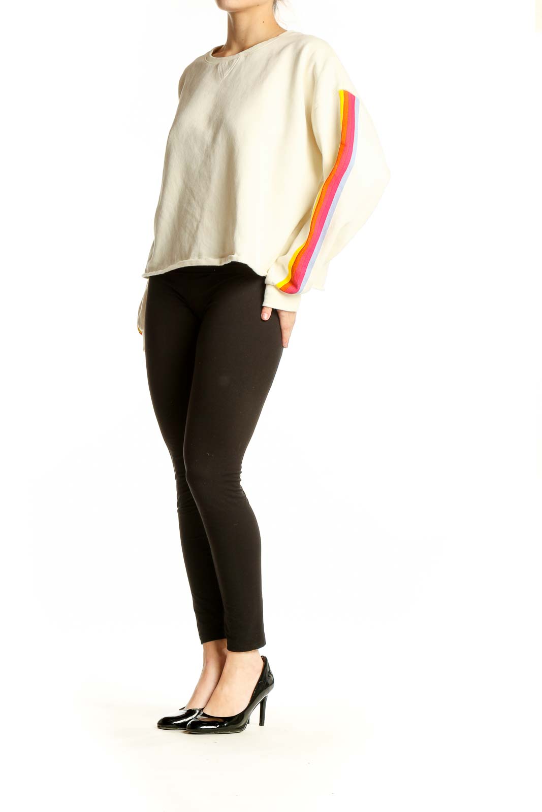 Front view of Marine Layer cream cropped sweatshirt with rainbow stripes on sleeves