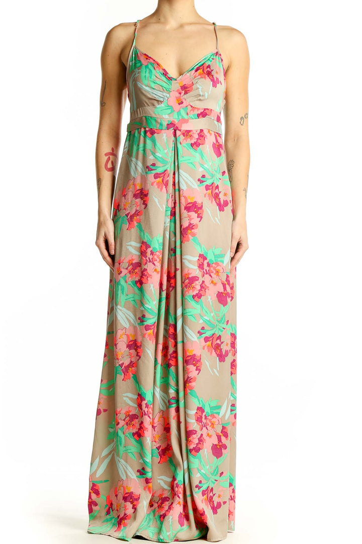 Front view of Silvian Heach beige floral maxi dress with pink flowers and green leaves