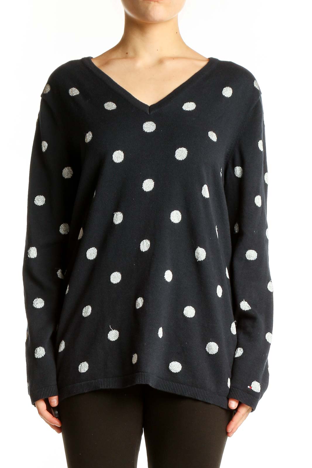 Front view of Tommy Hilfiger black V-neck sweater with white polka dots