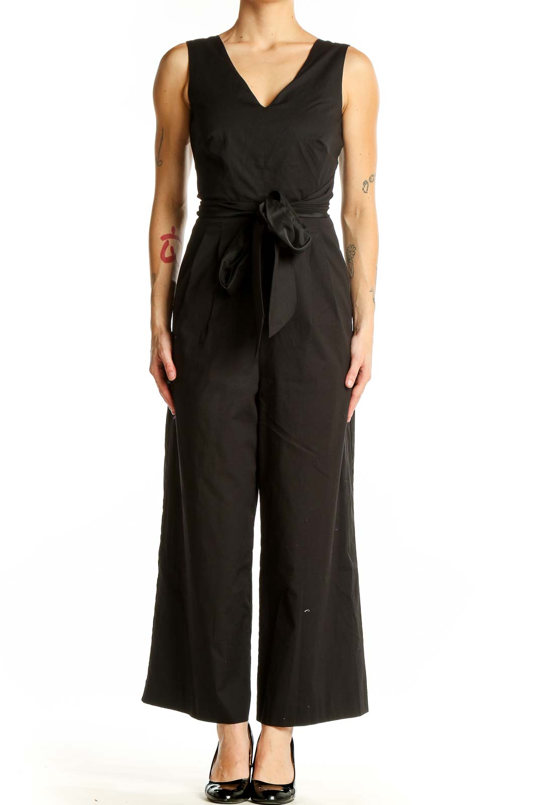 Front view of black J.Crew jumpsuit with V-neck and tie waist