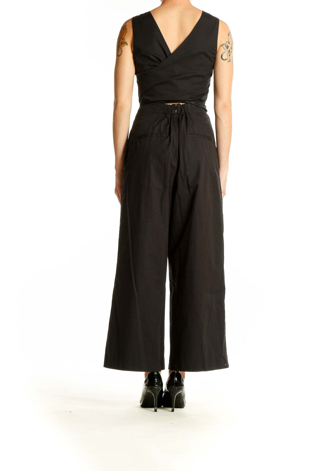 Side view of black J.Crew wide-leg jumpsuit