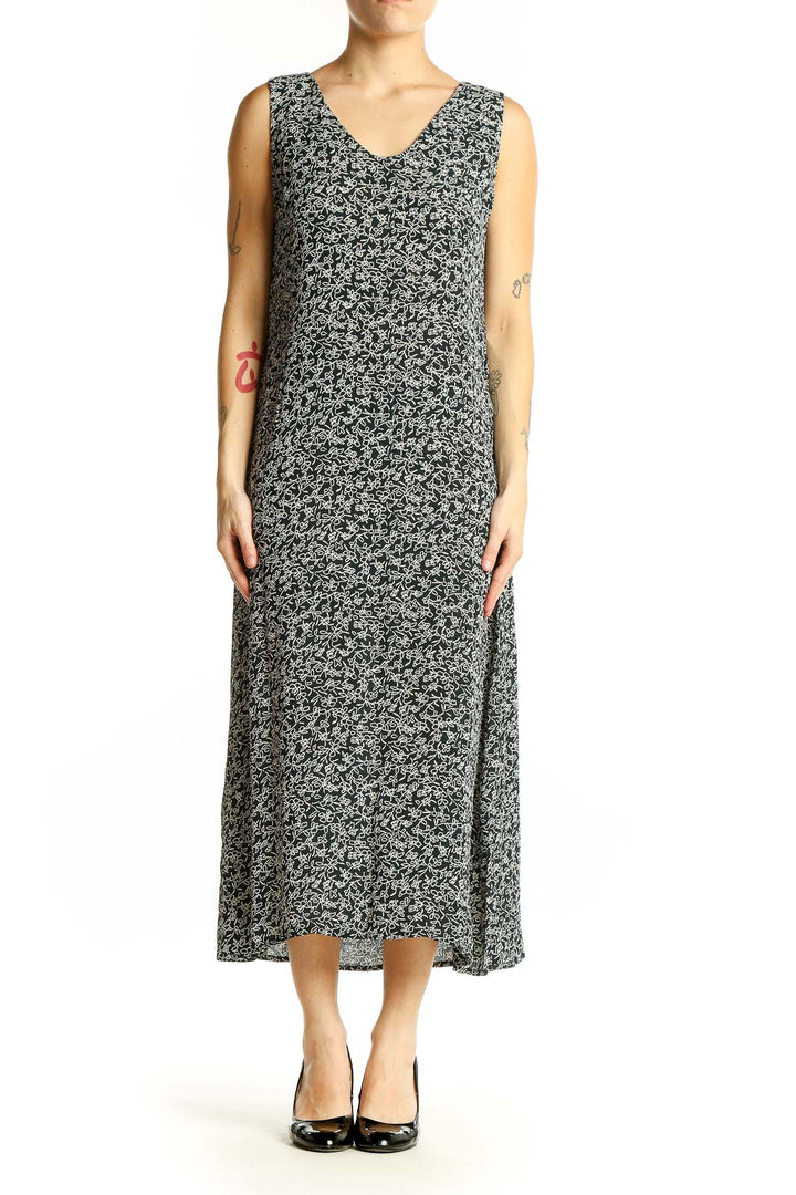 Front view of Maggy London black floral print sleeveless midi dress