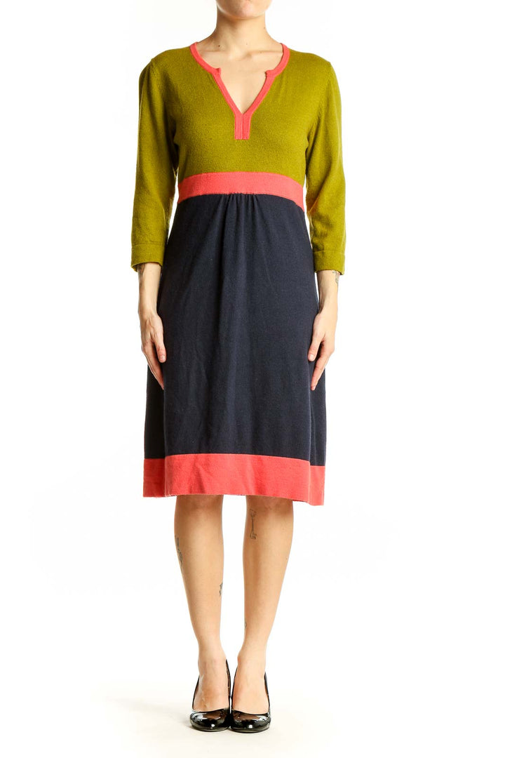 Front view of Boden color block dress with green top and navy skirt