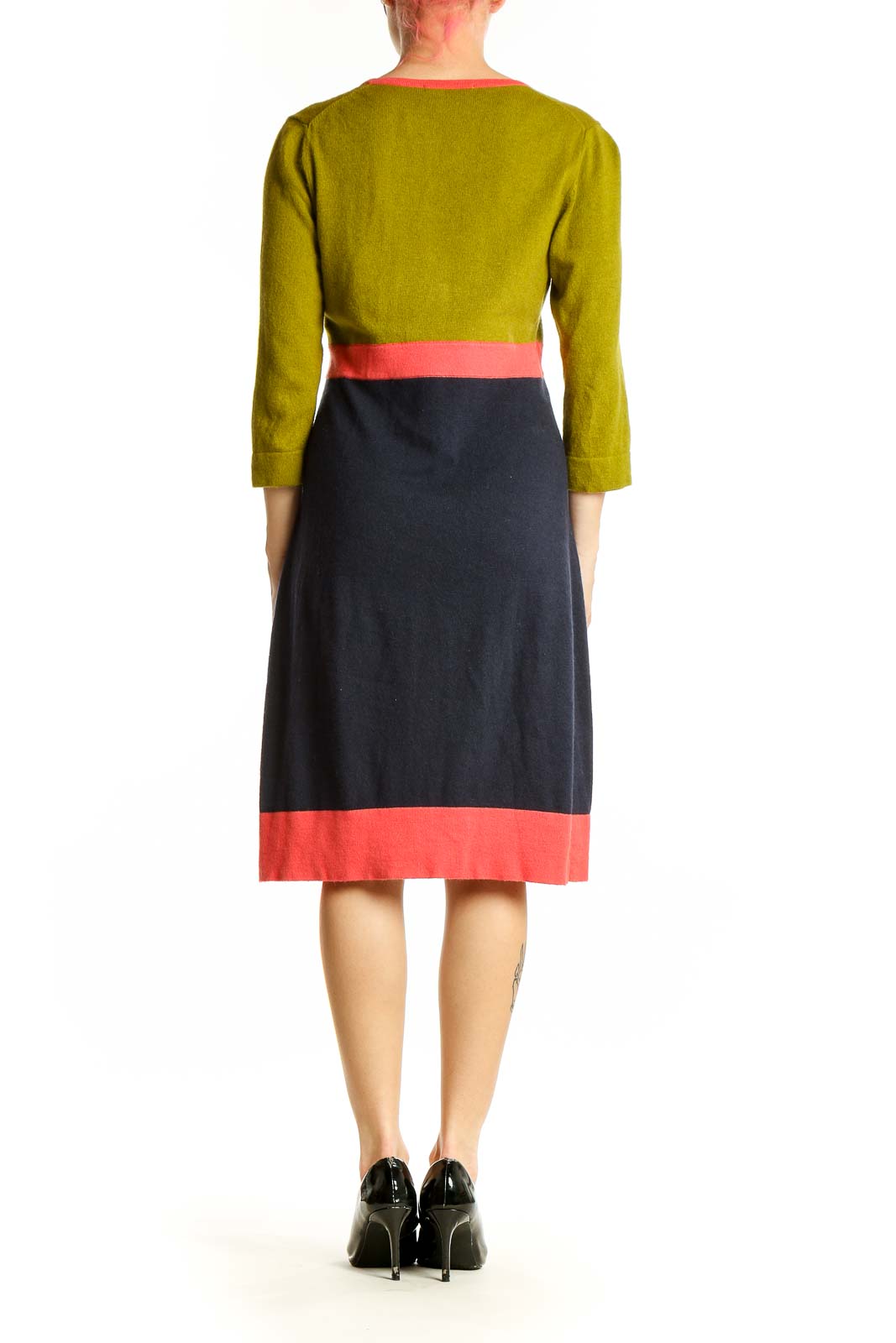 Side view of Boden color block dress showing v-neckline and coral trim
