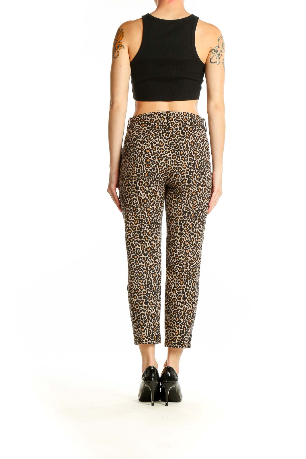 Side view of J.Crew leopard print cropped pants on model with black top