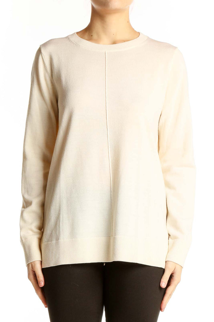 Front view of cream Merino wool crewneck sweater from Banana Republic