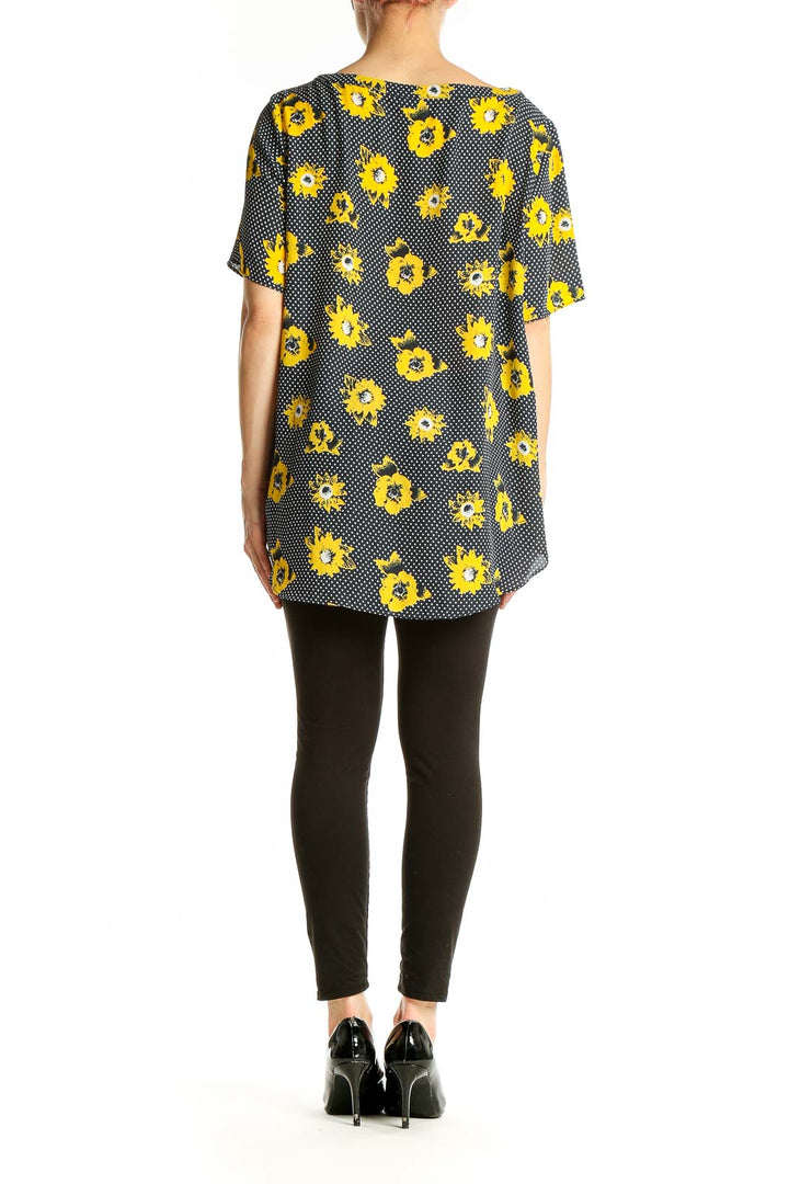 Back view of yellow floral polka dot blouse from Banana Republic
