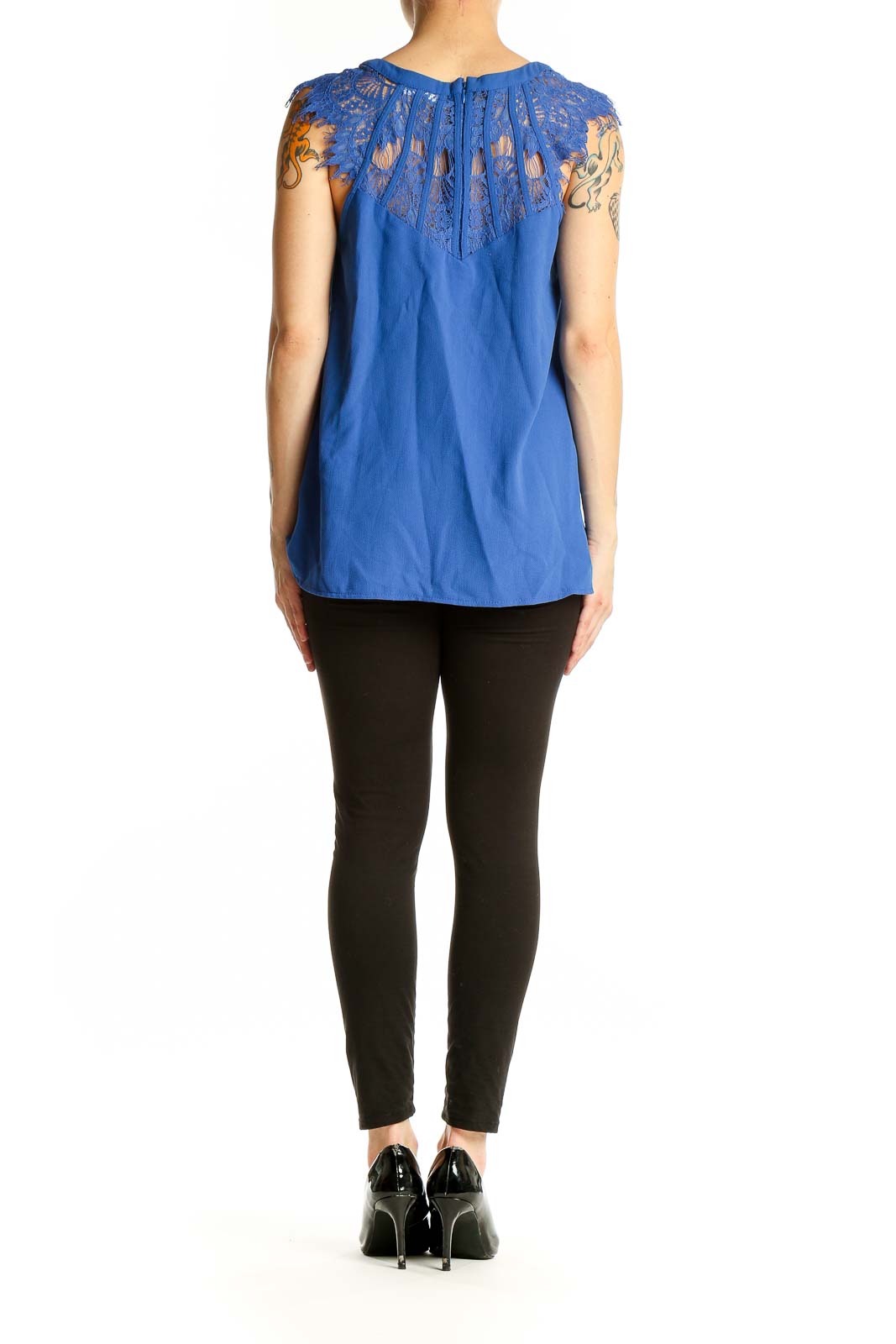 Side view of Brixon Ivy blue sleeveless blouse showing flowy silhouette