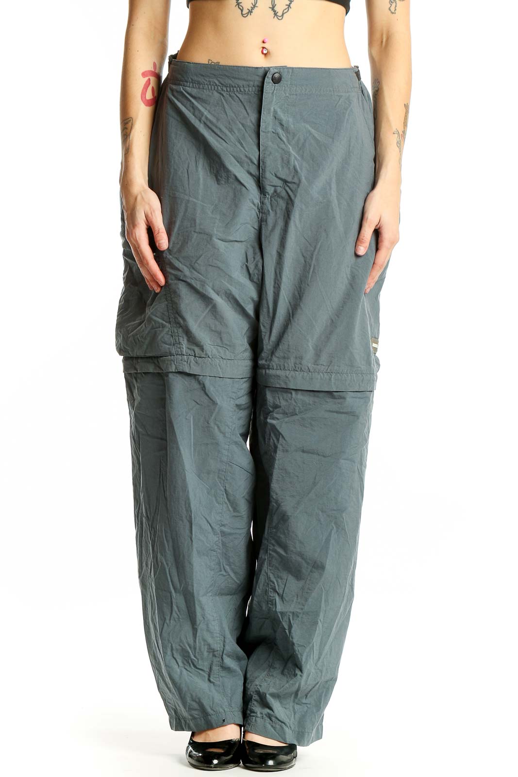 Front view of sage green REI convertible cargo pants