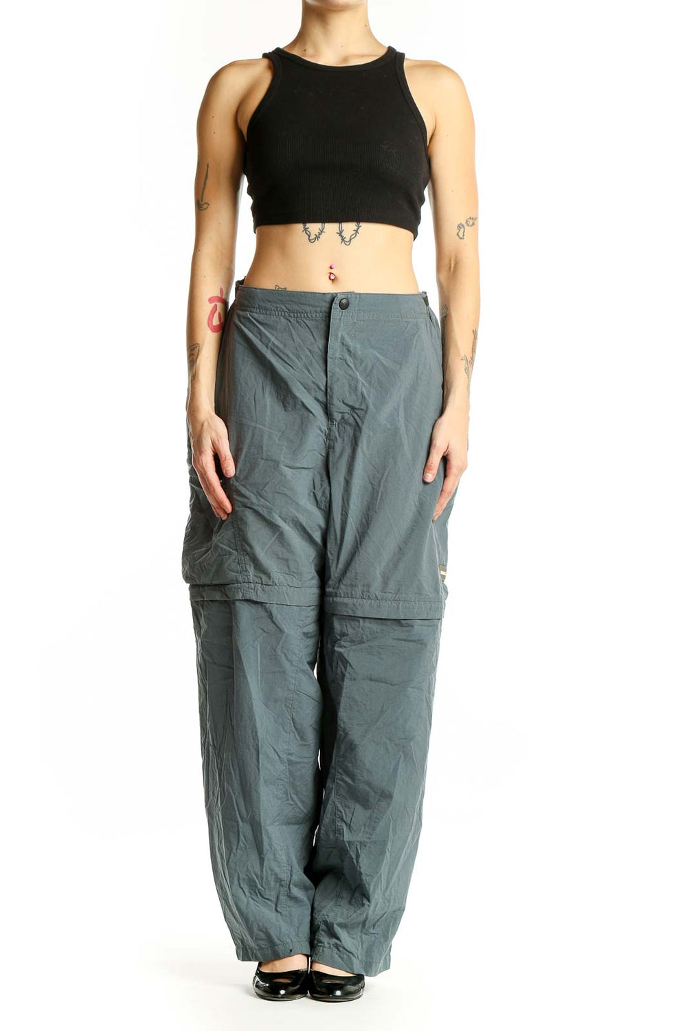 Front view of sage green REI convertible cargo pants