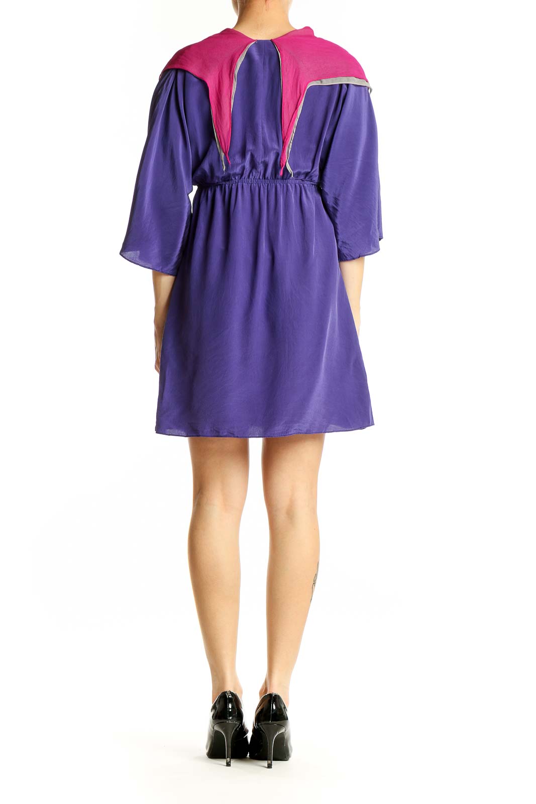 Side view of Amanda Uprichard purple silk mini dress showing empire waist and fuchsia scarf
