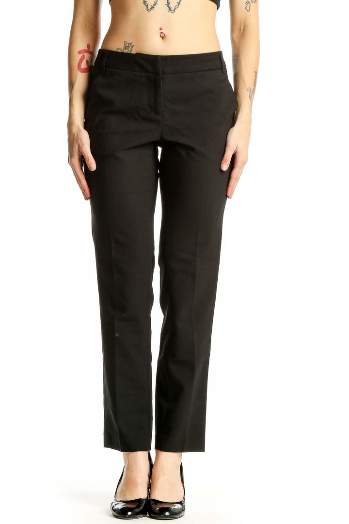 Front view of AMANDA + CHELSEA black straight-leg trousers