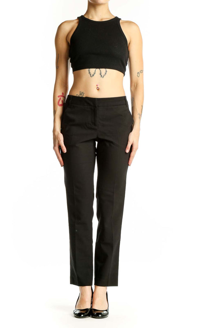 Front view of AMANDA + CHELSEA black straight-leg trousers