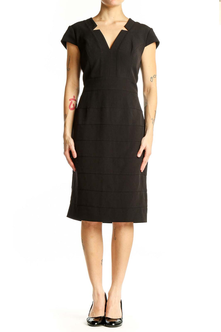 Front view of Adrianna Papell black cap sleeve sheath dress