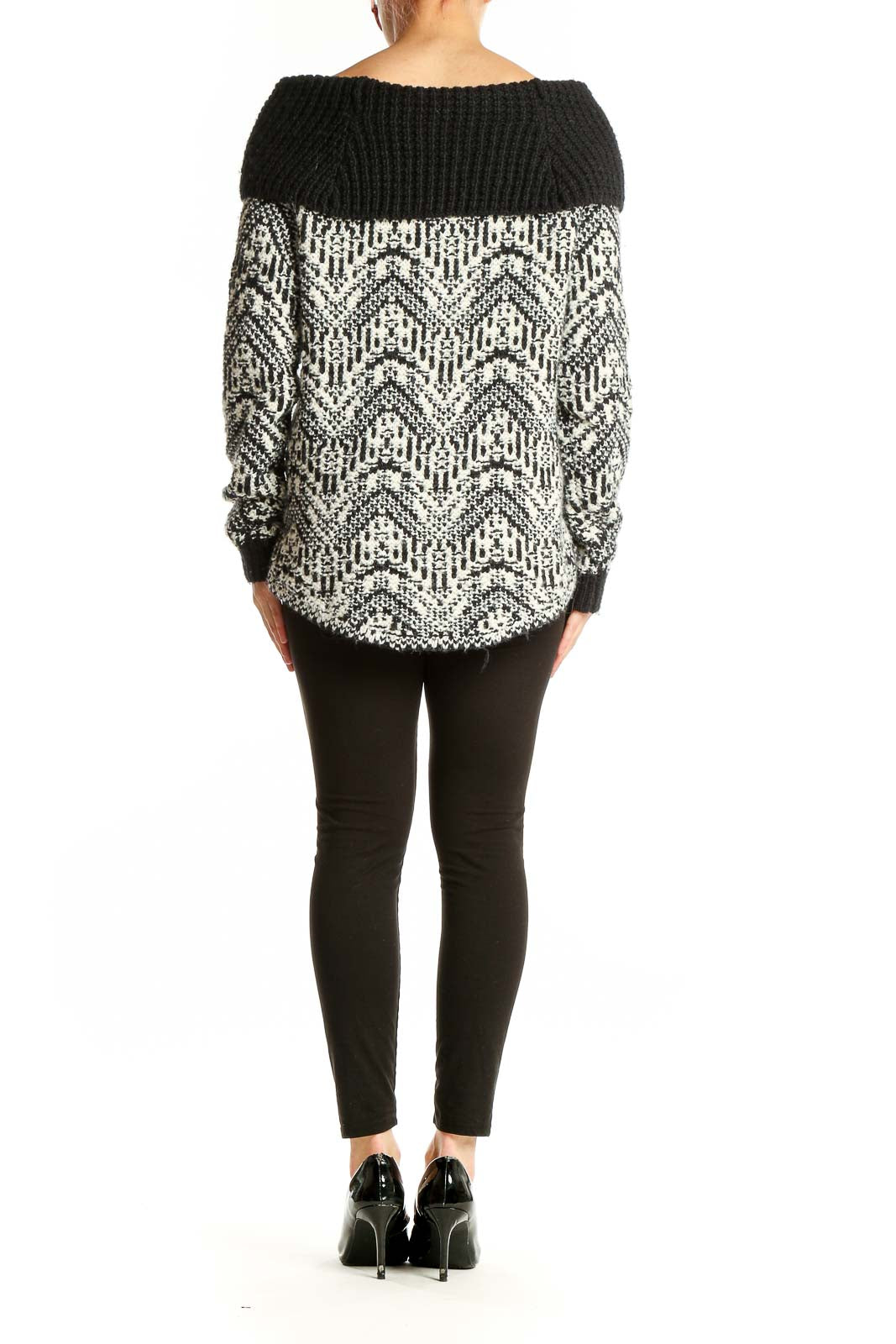 Side view of model wearing Abercrombie & Fitch black and white patterned cowl neck sweater