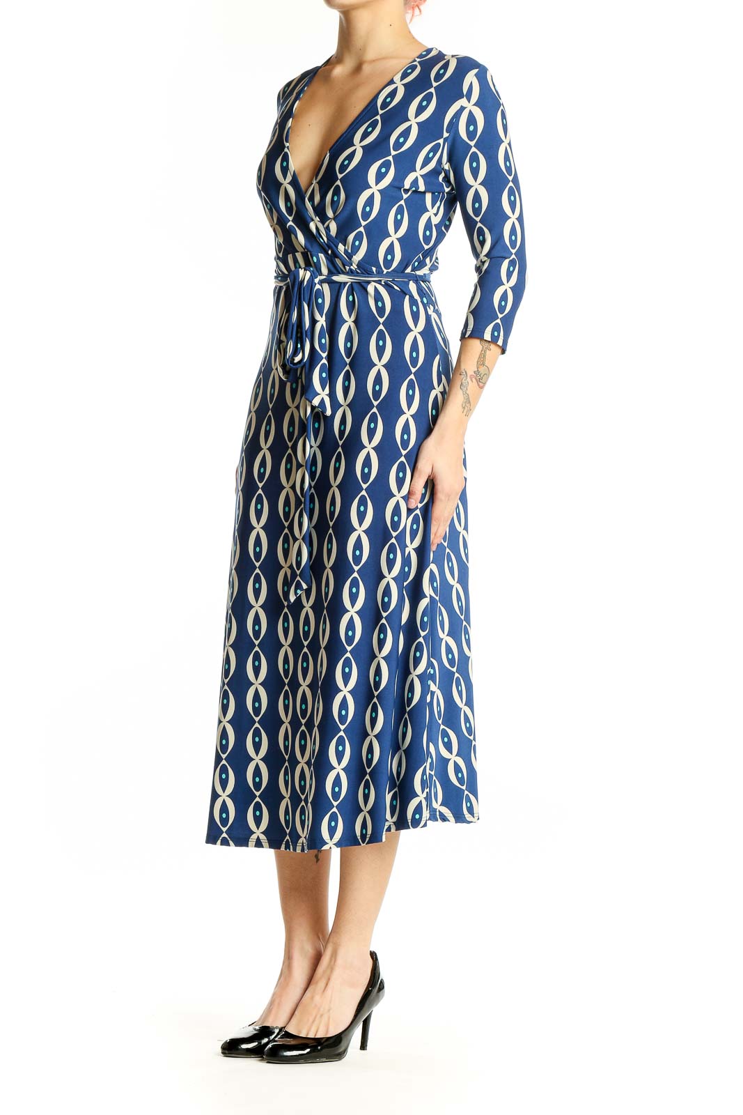 Front view of Leota blue geometric print wrap midi dress
