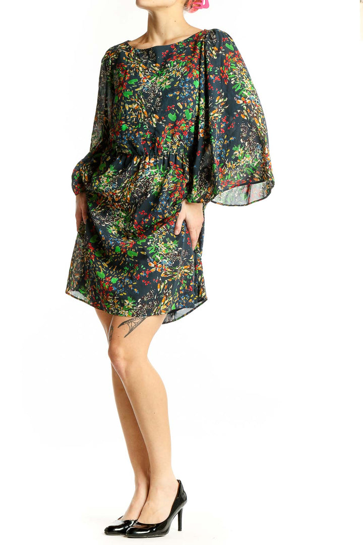 Front view of Alice + Olivia multicolor floral print silk dress with flowing sleeves