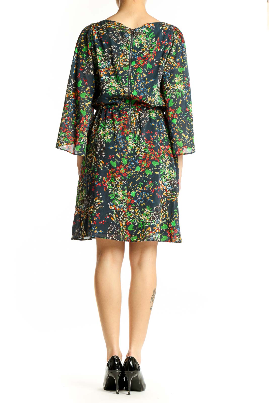 Back view of Alice + Olivia multicolor floral print silk dress showing full length and sleeve detail