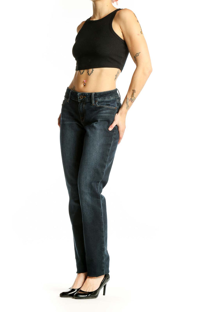 Front view of Lucky Brand dark blue straight leg jeans on model