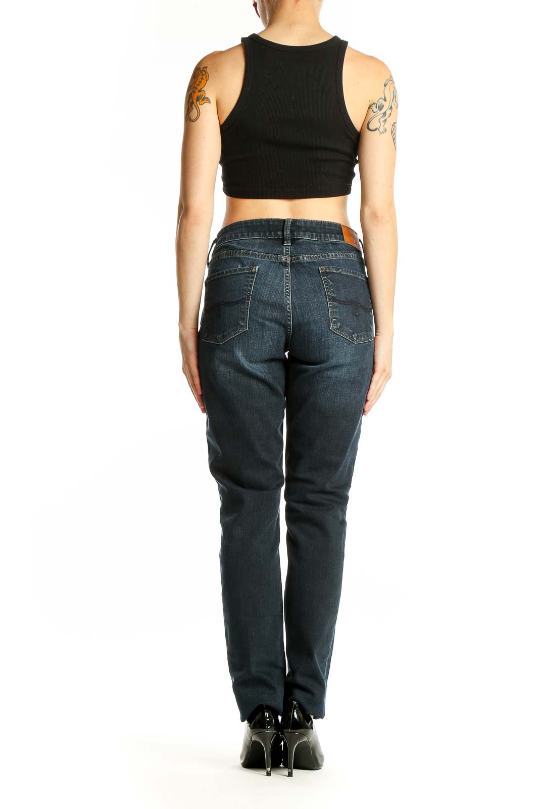 Back view of Lucky Brand dark blue straight leg jeans on model